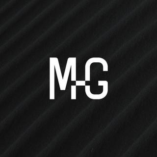 MG