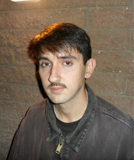 L.