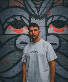 J.
