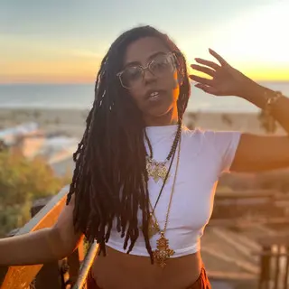 L.