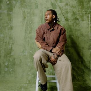 J.