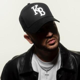 G.