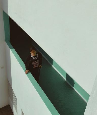 L.