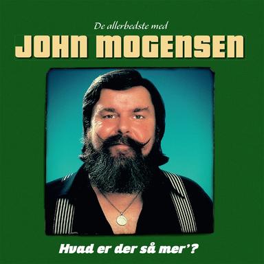 På Loftet Sidder Nissen Med Sin Julegrød